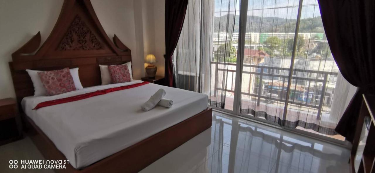 Sure Guesthouse Kamala Beach Extérieur photo